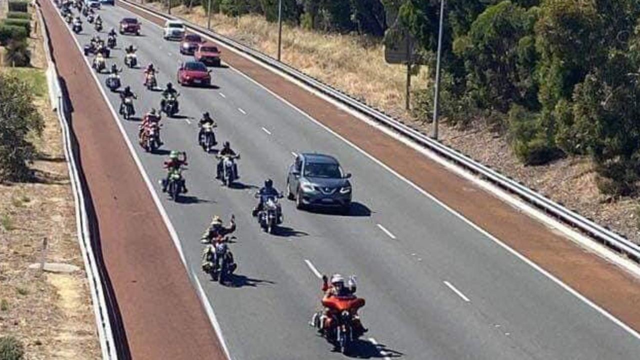 Charity rider killed and three others injured in horrific Perth freeway