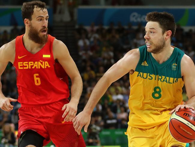 Australia’s Matthew Dellavedova drives to the basket against Sergio Rodriguez of Spain. Picture: Christian Petersen