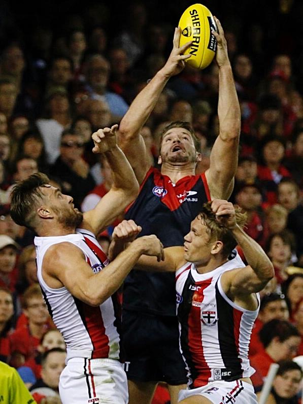 Jesse Hogan marks over Sam Fisher and Sam Gilbert. Picture: George Salpigtidis