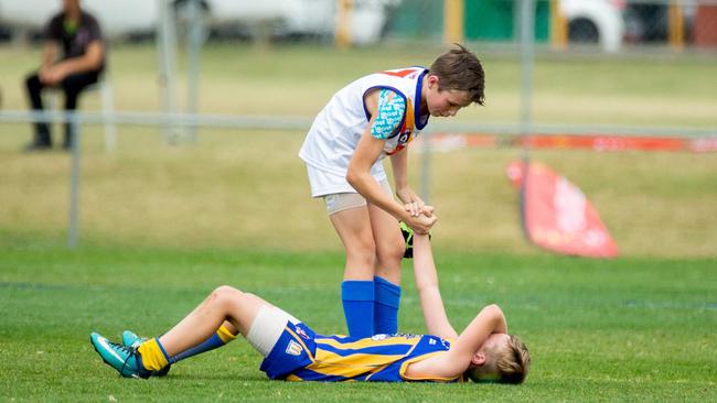 There will be winners and losers on grand final day. (AAP Image/Richard Walker)