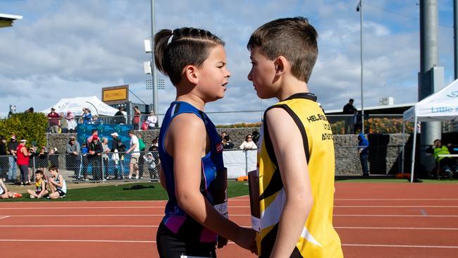 Little Athletics sportsmanship on show. Pic: Steven Markham