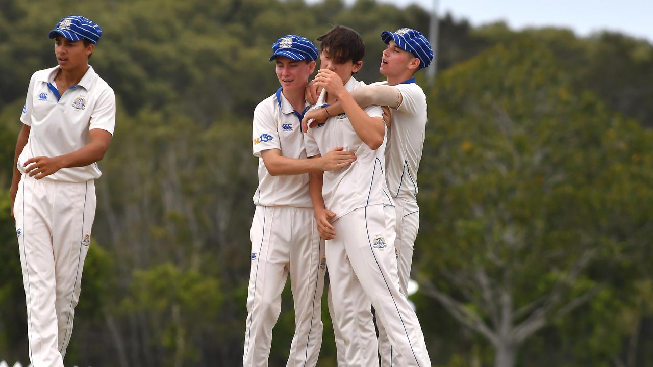 St Joseph's Nudgee College bowler Tom Malone gets the team congratulations. Picture, John Gass