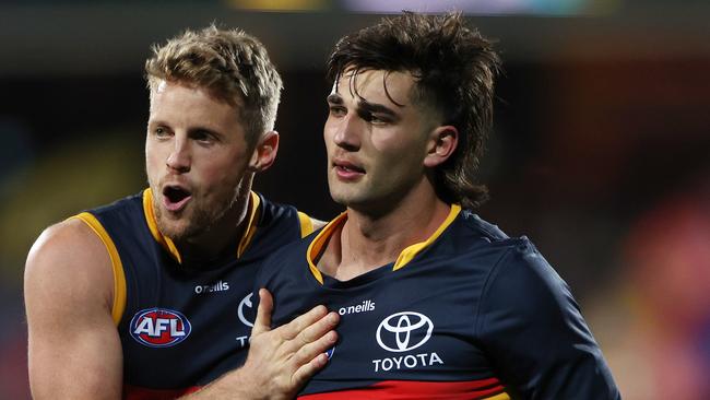 Rory Sloane tries to calm down Josh Rachele. Picture: Getty Images