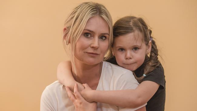 Alisha Toy and her daughter Stevie, 5, were turned back after flying from Adelaide to Perth to see their family for the first time since January. Picture: Roy VanDerVegt