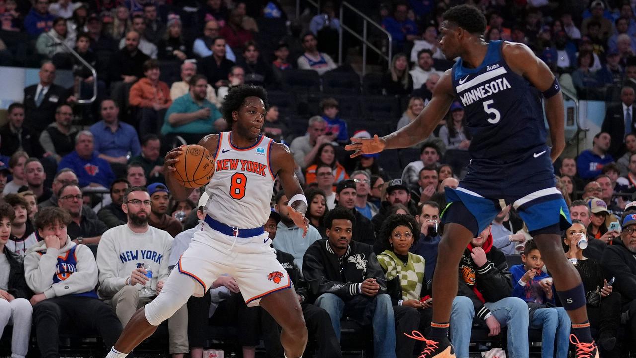 NEW YORK, NEW YORK - JANUARY 1: OG Anunoby #8 of the New York Knicks dribbles the ball against Anthony Edwards #5 of the Minnesota Timberwolves in the second half at Madison Square Garden on January 1, 2024 in New York City. The Knicks defeated the Timberwolves 112-106. NOTE TO USER: User expressly acknowledges and agrees that, by downloading and or using this photograph, User is consenting to the terms and conditions of the Getty Images License Agreement. Mitchell Leff/Getty Images/AFP (Photo by Mitchell Leff / GETTY IMAGES NORTH AMERICA / Getty Images via AFP)