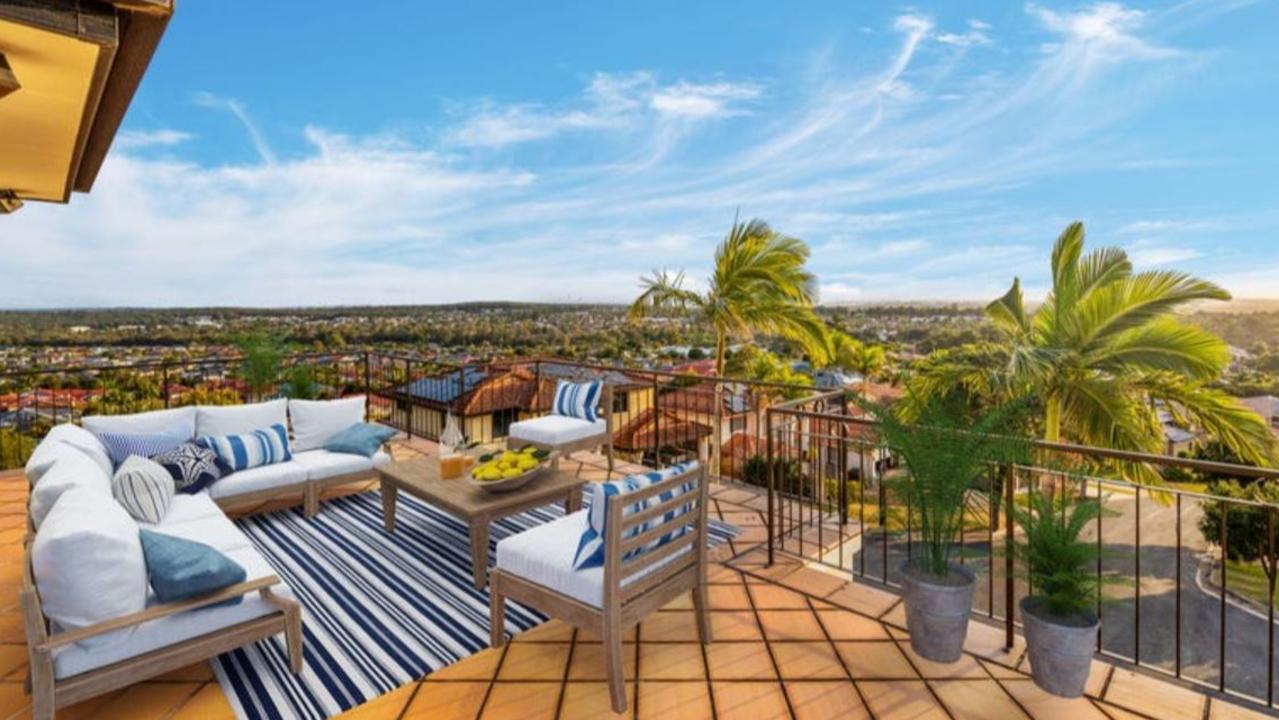 An expansive skyline spreads out from this wide balcony view.