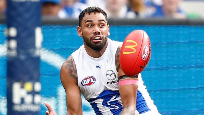 MELBOURNE, AUSTRALIA - AUGUST 19: Tarryn Thomas of the Kangaroos marks the ball during the 2023 AFL Round 23 match between the Richmond Tigers and the North Melbourne Kangaroos at Melbourne Cricket Ground on August 19, 2023 in Melbourne, Australia. (Photo by Michael Willson/AFL Photos via Getty Images)