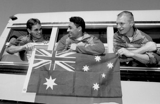 NT boxer James Swan (left) on the Australian bus on way to the 1994 Commonwealth Games in Victoria, Canada with Richard Rowles and Armin Diehl.