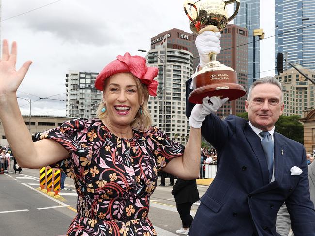 MELBOURNE . 31/10/2022.  RACING.  Lexus Melbourne Cup Parade up St Kilda rd to Federation Square. Lord Mayor Sally Capp and Victoria Racing Club chairman Neil Wilson with the cup in Federation Square    . Picture by Michael Klein