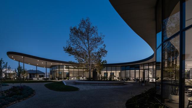 A 14m-tall scarlett oak tree remains a feature of the courtyard.