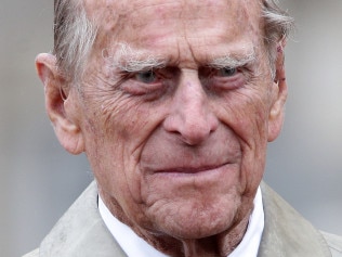 Britain's Prince Philip, Duke of Edinburgh, in his role as Captain General, Royal Marines, attends a Parade to mark the finale of the 1664 Global Challenge on the Buckingham Palace Forecourt in central London on August 2, 2017.   Prince Philip, the 96-year-old husband of Queen Elizabeth II, conducted his final solo public engagement on August 2, 2017, overseeing a military parade in the pouring rain before retiring from a lifetime of service. The Duke of Edinburgh, wearing a raincoat and bowler hat, met members of the Royal Marines and veterans -- many younger than him -- before taking the salute in the forecourt of Buckingham Palace.   / AFP PHOTO / POOL / Yui Mok