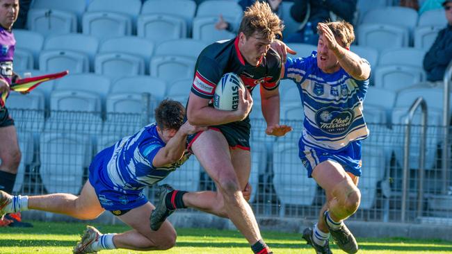 Sam McCann surges towards the line. Picture: Thomas Lisson.