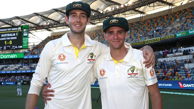 New caps Kurtis Patterson and Jhye Richardson celebrate Australia’s big win.