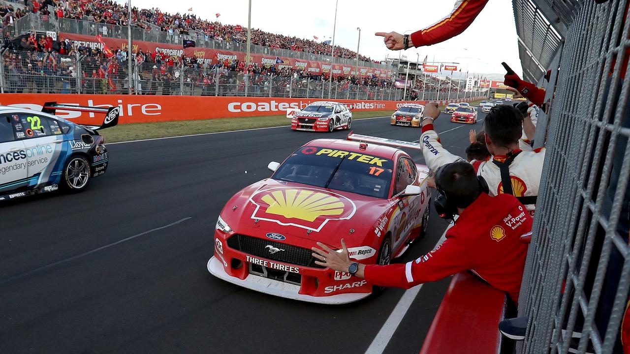 Scott McLaughlin greets his team after crossing the line on Sunday. Picture: Robert Cianflone