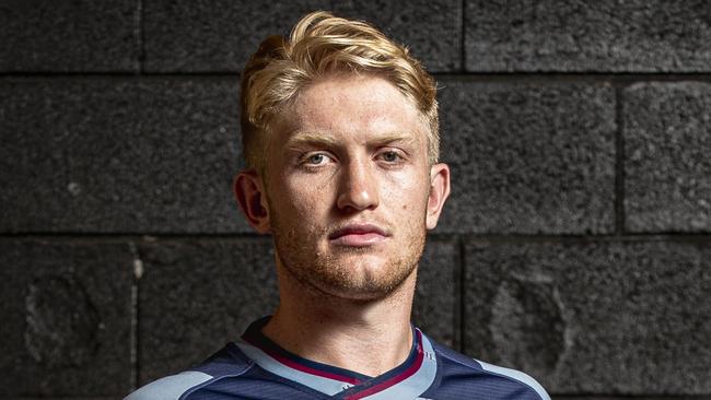 Utility back Isaac Lucas shows off the new Queensland Reds alternate jersey that will be worn in trials and when jersey colours clash on the road in 2020. Picture: Brendan Hertel, QRU