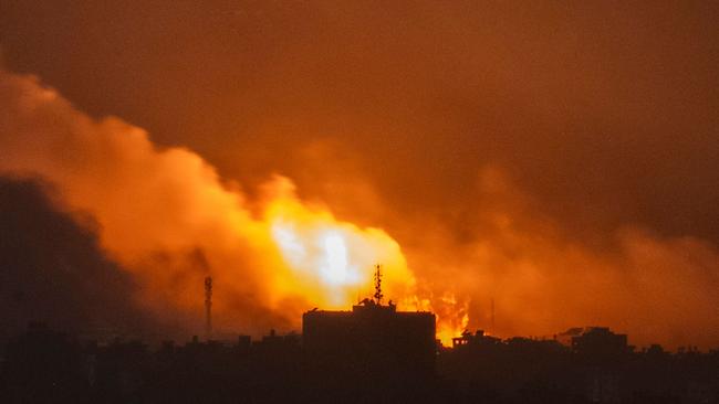 The view from Sderot along the border with the Gaza Strip early on Sunday. Picture: AFP