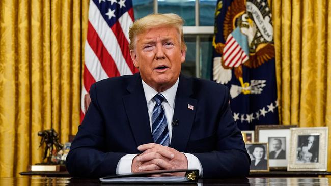 US President Donald Trump addresses the Nation from the Oval Office about the coronavirus (Covid-19) crisis in Washington, DC on March 11.