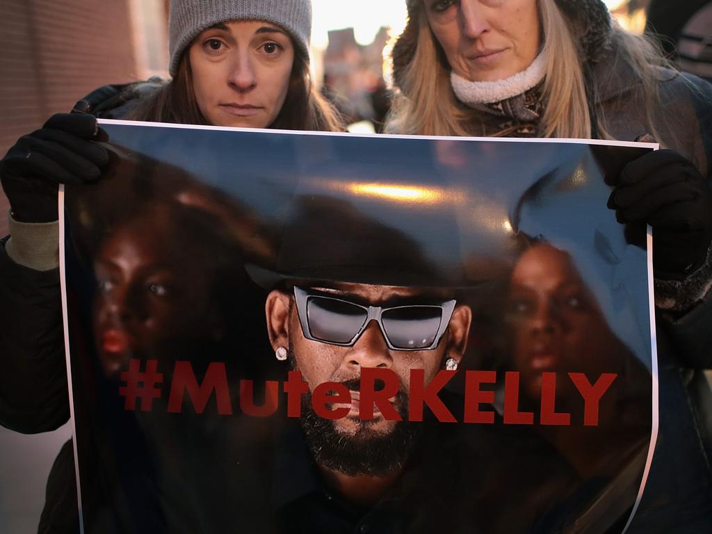 Demonstrators gather near the studio of singer R Kelly to call for a boycott of his music after the allegations. Picture: AFP