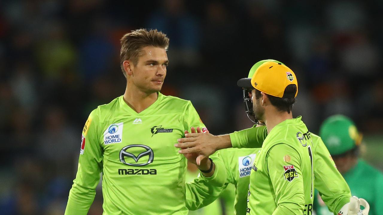 Chris Green celebrates with Callum Ferguson after dismissing Ben Dunk of the Stars.