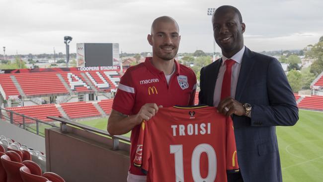 Adelaide United recruit James Troisi with Reds director of football Bruce Djite at Hindmarsh Stadium. Picture: Adelaide United