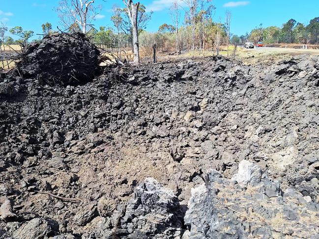 The aftermath of the explosion on the Bruce Highway at Bororen.