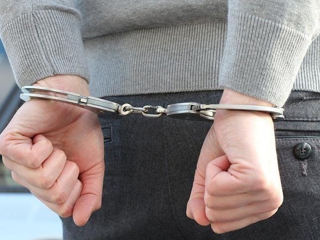 Man accused of kicking, kneeing and spitting on Toowoomba cops