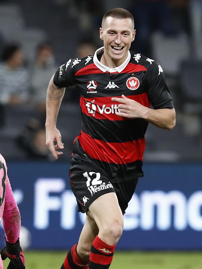 Mitchell Duke celebrates scoring for the Wanderers in March.