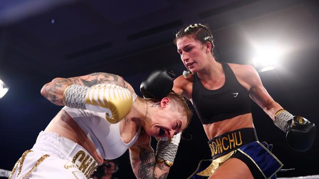 Jasmine Parr punches Nicila Costello during their WIBA Flyweight World Title fight at The Star Gold Coast on December 03, 2022 in Gold Coast, Australia. (Photo by Chris Hyde/Getty Images)