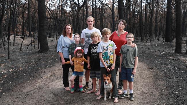 Amanda Smith, left, says the southerly change that saved her home was ‘like a miracle’. Picture: John Feder