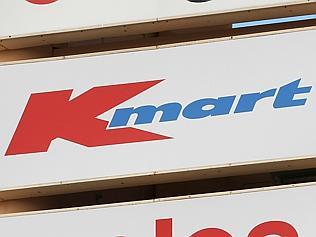 Coles and Kmart signage and trolley The Target Corp., Kmart and Coles logos are displayed on a sign in Perth, Australia, on M...