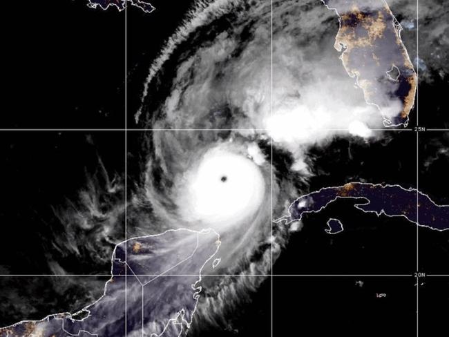 Hurricane Milton - 9 Oct 2024 - 0:00 UTC ...MILTON WILL BRING LIFE-THREATENING STORM SURGE AND WINDS TO PORTIONS OF THE FLORIDA GULF COAST... As of 7:00 PM CDT Tue Oct 8 the center of Milton was located near 23.0, -86.9 with movement ENE at 10 mph. The minimum central pressure was 902 mb with maximum sustained winds of about 165 mph - Image Supplied NOAA