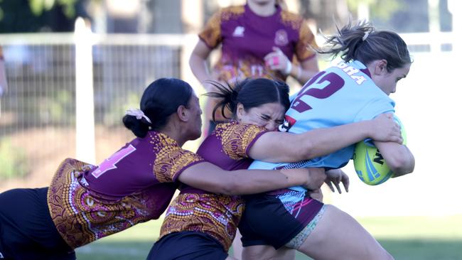 Keebra Park’s Chelsea Coleman is tackled. Photo Steve Pohlner