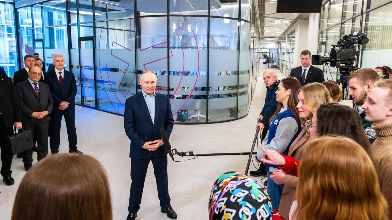 Russian President Vladimir Putin meets with students while visiting the Moscow State University on the Students' Day in Moscow. Picture: AFP