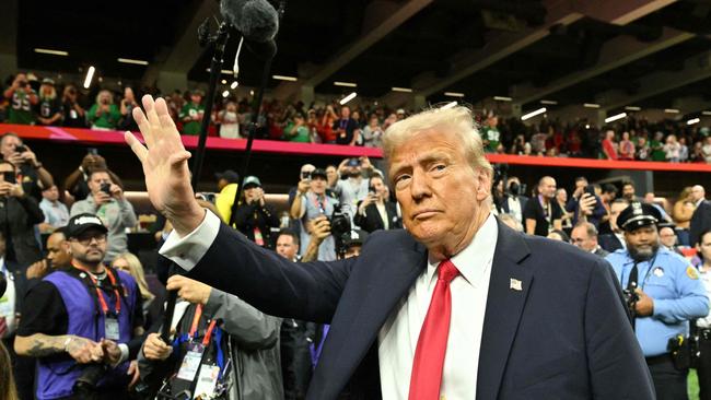 US President Donald Trump visits the field before the start of Super Bowl LIX between the Kansas City Chiefs and the Philadelphia Eagles at Caesars Superdome in New Orleans, Louisiana, February 9, 2025. (Photo by ROBERTO SCHMIDT / AFP)