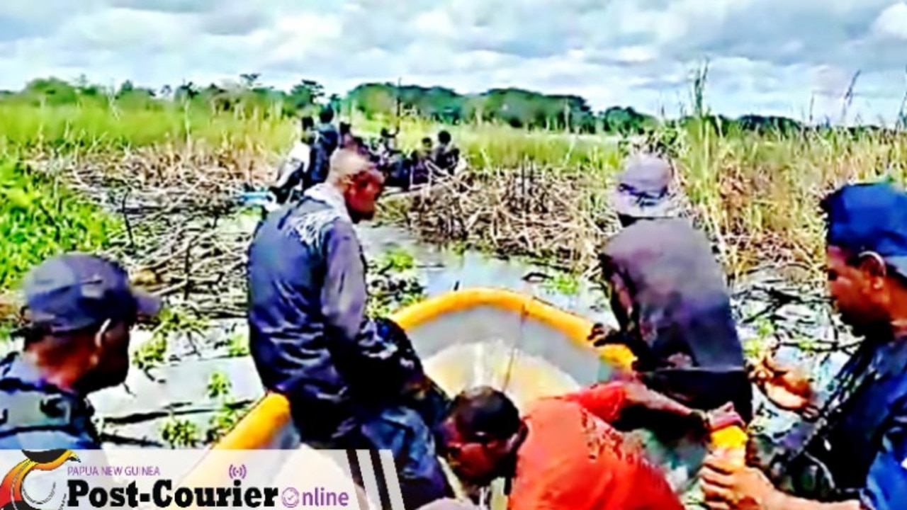 Police search the Sepik River for bodies after the massacre. Picture: Post Courier