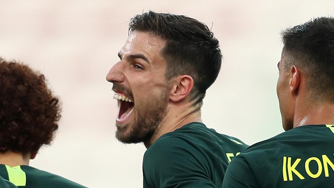 DUBAI, UNITED ARAB EMIRATES - DECEMBER 30:  Milos Degenek (C) of Australia celebrates with team-mates after scoring the fourth goal during the International Friendly match between Australia and Oman at Maktoum Bin Rashid Al Maktoum Stadium on December 30, 2018 in Dubai, United Arab Emirates.  (Photo by Francois Nel/Getty Images)