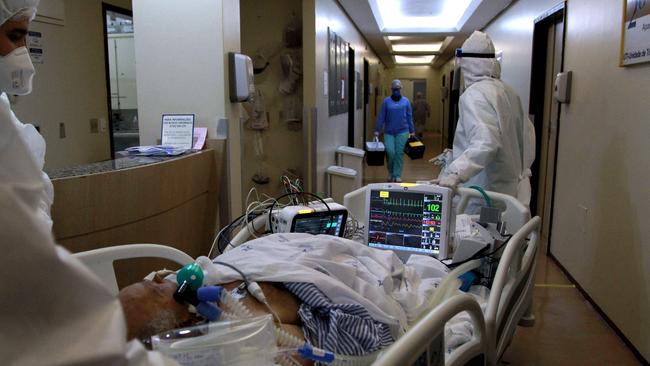 A patient is transferred to the Intensive Care Unit of the Santa Casa de Misericordia Hospital in Porto Alegre, Brazil. Picture: AFP