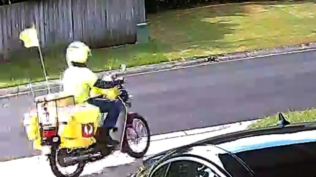 The Australia Post postie was allegedly caught on camera dumping thousands of LNP postal vote applications into a homeowners bin in the marginal Queensland seat of Blair.