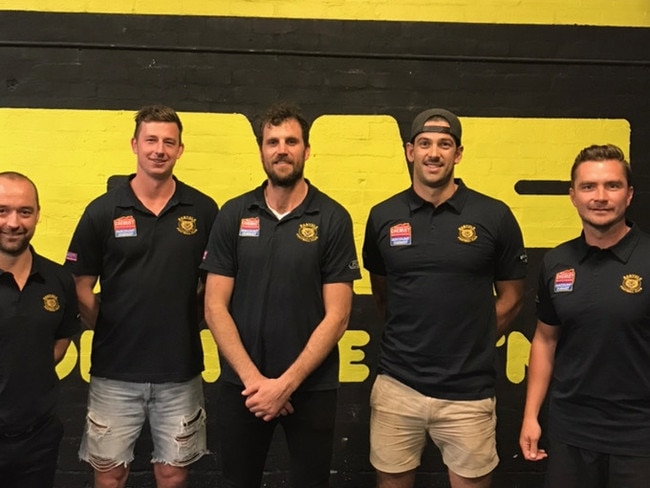 Banyule coach Paul Harris with recruits Jack Langford, Scott Gumbleton, Tim Martin and Ricky Dyson.