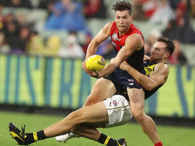 AFL Round 6.   24/04/2021.  Melbourne vs Richmond at the MCG, Melbourne.  Jack Viney of the Demons tackled by Richmonds Noah Balta during the 2nd qtr.   . Pic: Michael Klein