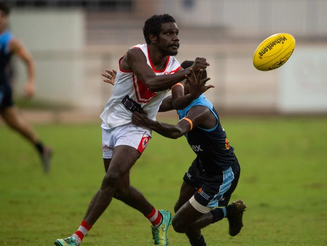 Round 17 NTFL: Darwin Buffaloes v Waratah at TIO Stadium. Timothy Mosquito with a handpass.Photograph: Che Chorley