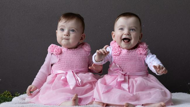 Identical twins, Evelyn (white sleeves) and Genevieve (pink sleeves) had twin to twin transfusion syndrome and underwent fetal laser surgery while still in the womb. They were born prematurely at 23 weeks and one day gestation. Picture: David Kelly