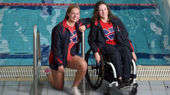 Para-athlete Isabella Vincent, who broke five national records at the SA Short Course Swimming Championships, with Norwood teammate Emily White. Picture: Naomi Jellicoe