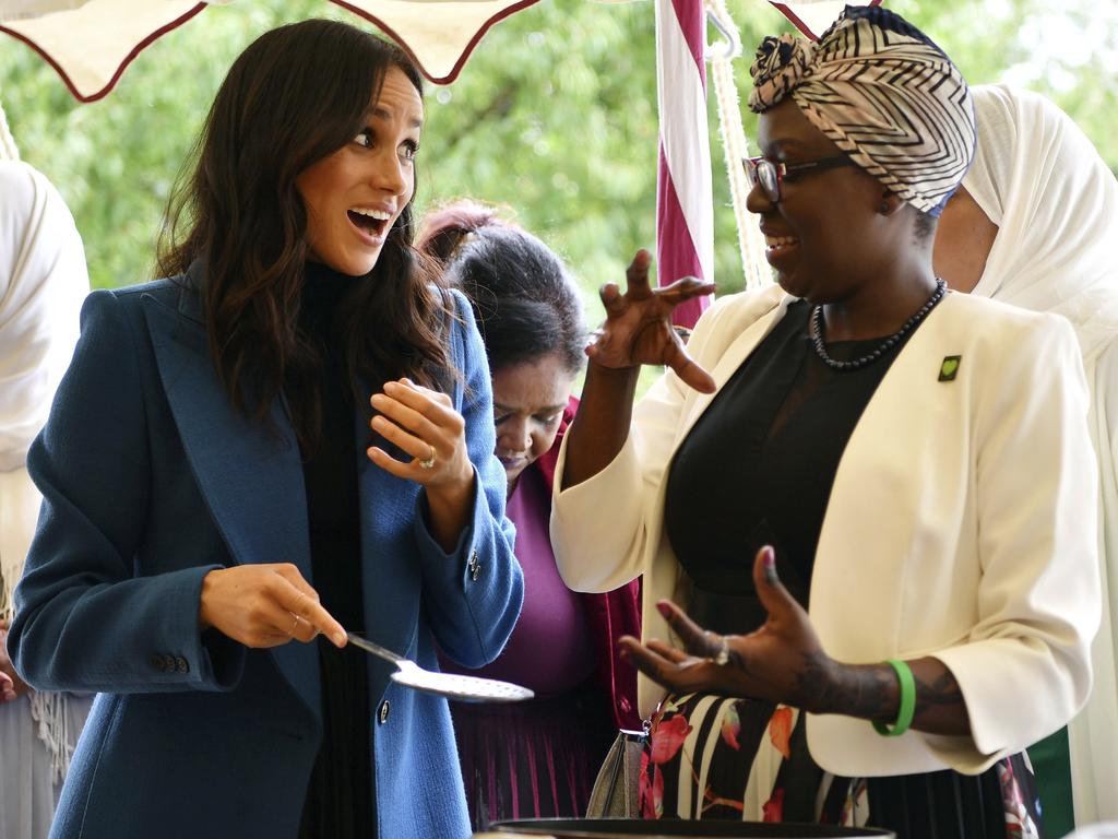 Meghan speaks with one of the women behind the cookbook "Together" during a reception at Kensington Palace, in London, Thursday Sept. 20, 2018. Picture: AP