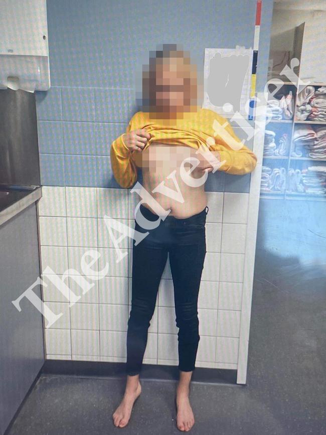 The woman was photographed in a state of undress while in custody. The Advertiser has pixelated the image to protect the woman’s privacy. Picture: Supplied