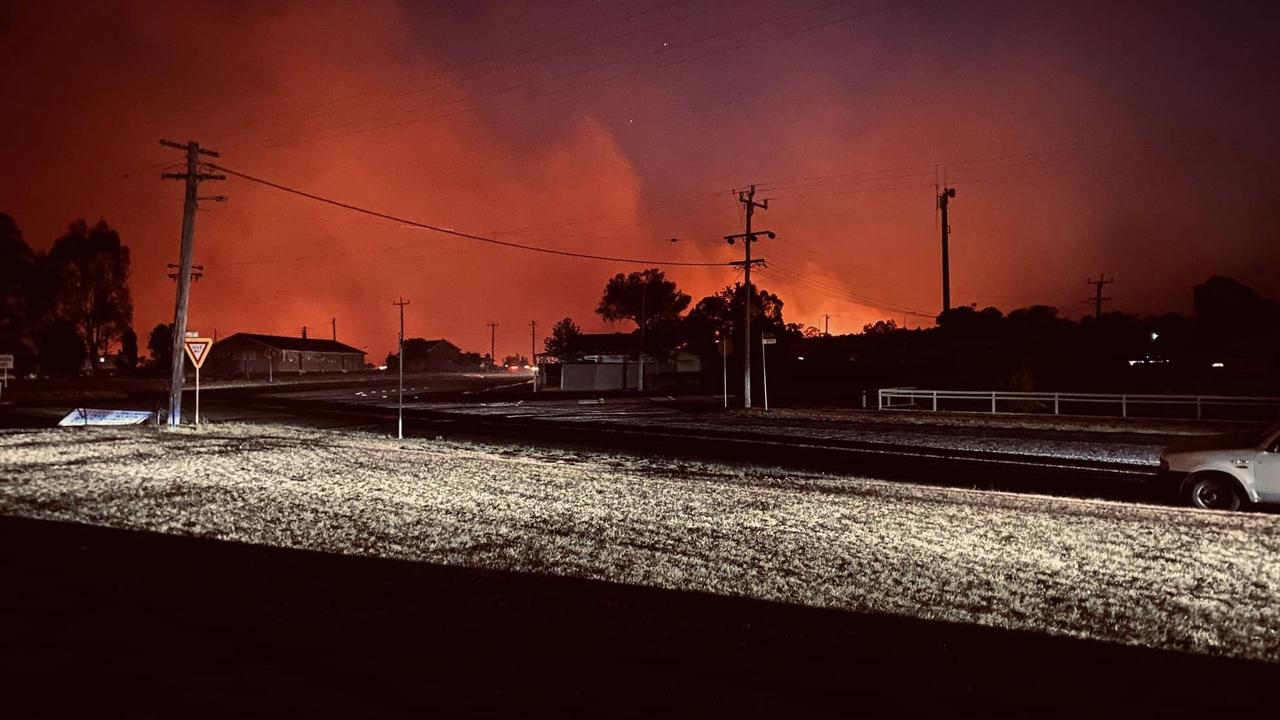 The haunting glow as bushfires raged into the night near Wallangarra.