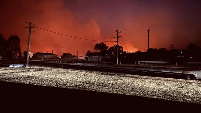 The haunting glow as bushfires raged into the night near Wallangarra.