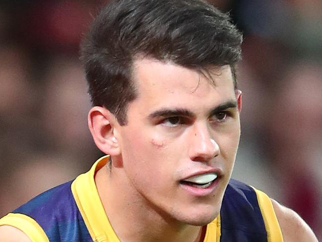 BRISBANE, AUSTRALIA - AUGUST 23: Brandon Starcevich of the Lions kicks during the round 13 AFL match between the Brisbane Lions and the St Kilda Saints at The Gabba on August 23, 2020 in Brisbane, Australia. (Photo by Chris Hyde/Getty Images)