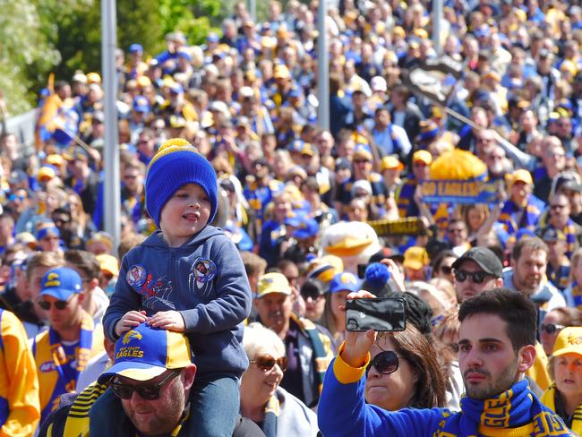 2018 AFL Grand Final at the MCG between Collingwood Magpies and West Coast Eagles. Fans arrive at the MCG. West Coast Eagles fan club enter the MCG. Picture: Jason Edwards