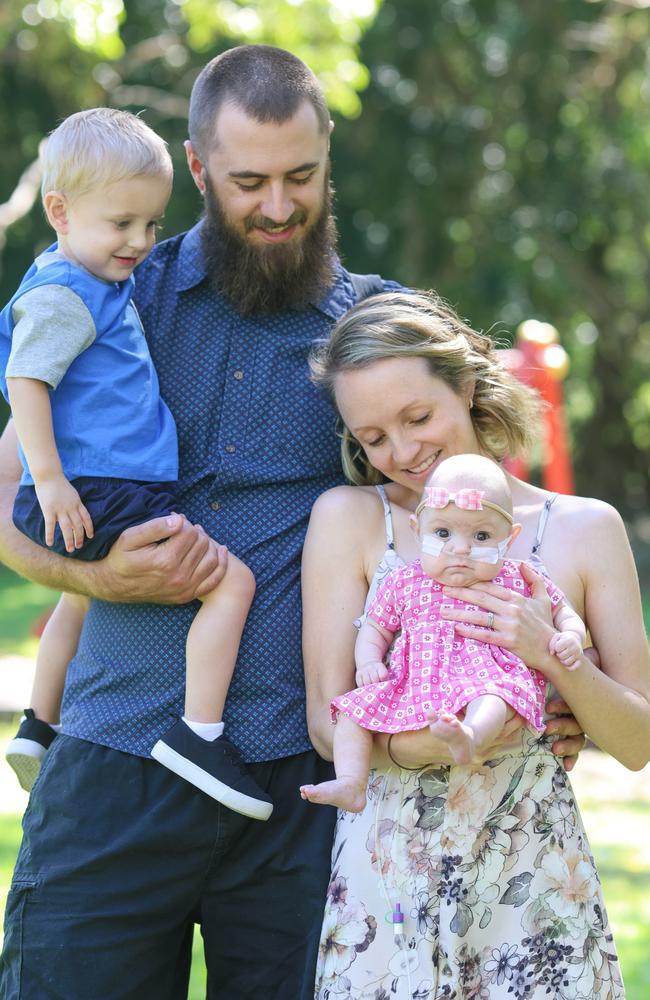 Miracle baby Chelsea with her mum Tia, dad Toby and brother Lachlan. Picture: Peter Wallis